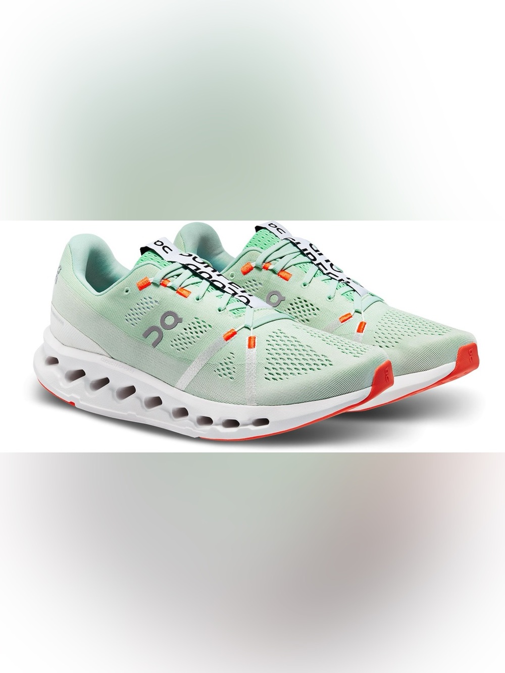 On Running Women's Mint Athletic Running Shoes with Orange Accents